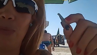 Bikini-Clad Wife Shows Off Her Anal And Vagina On A Crowded Beach