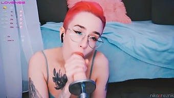 A Young Girl With A Tomboyish Look Receives Oral Sex From A Fuck Machine
